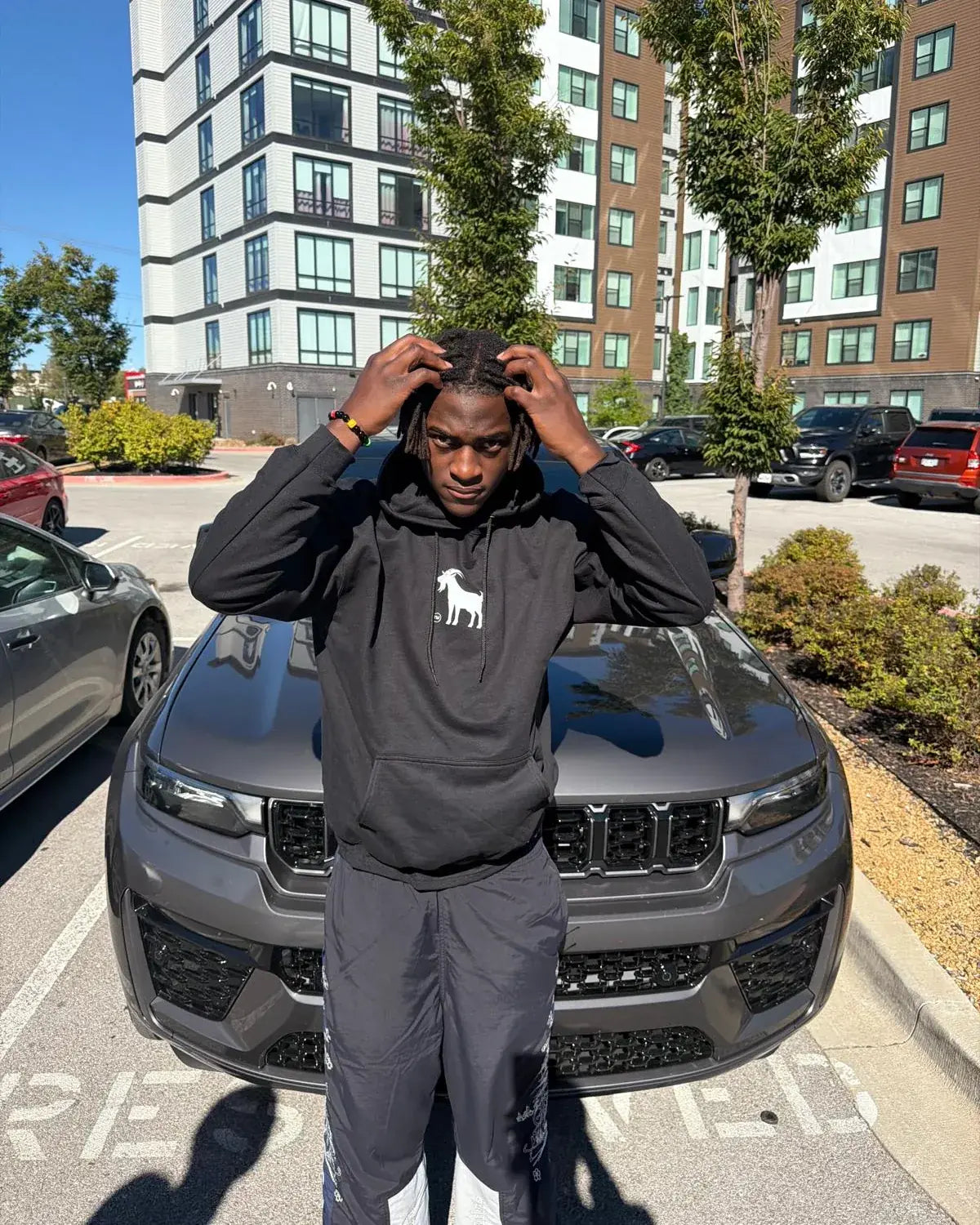 Abdou Toure in a black Goatville hoodie